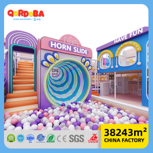 Área de juegos interior infantil con tema Dreamy Macaron para centro de entretenimiento familiar
